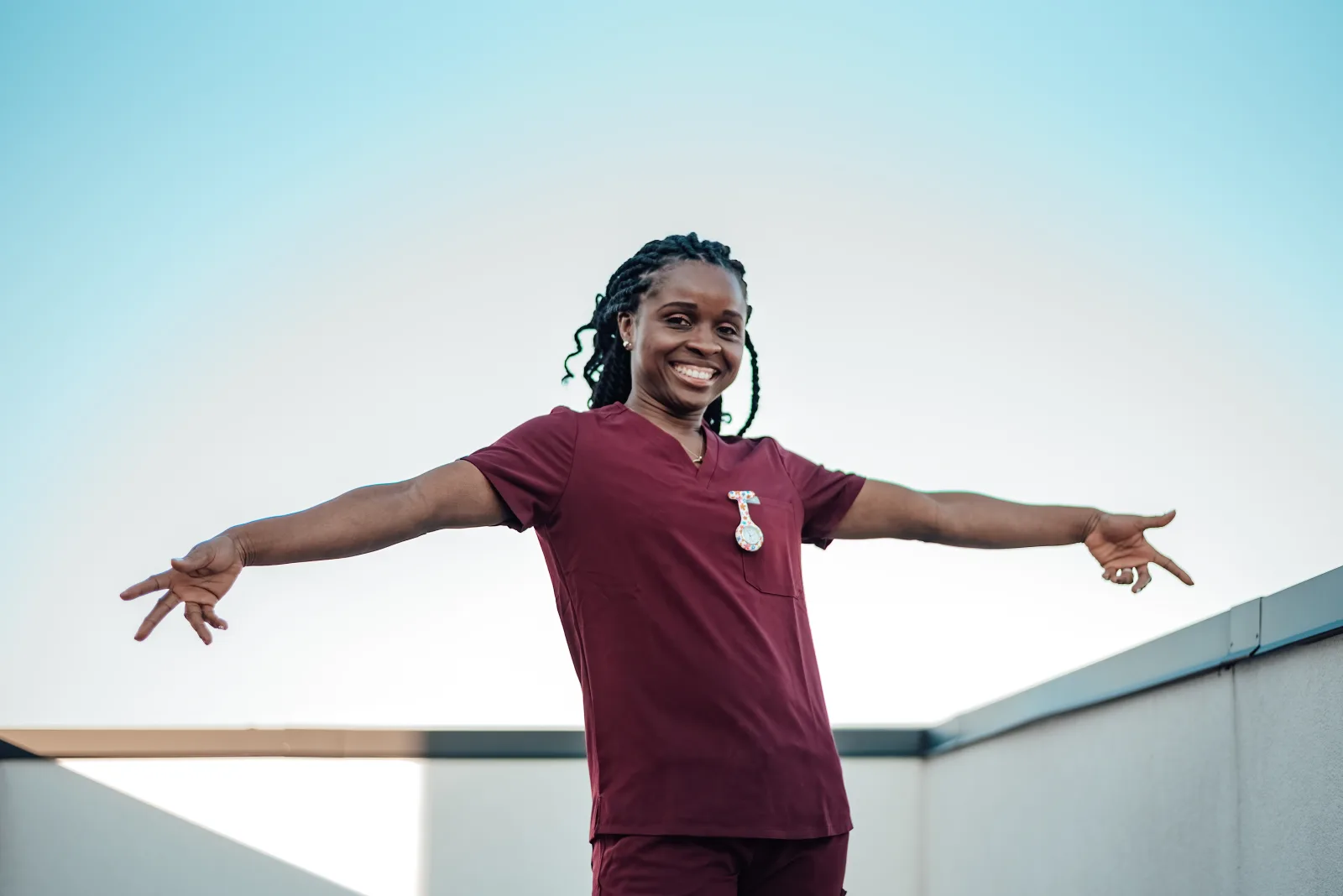Theresa Yirerong in nursing scrubs